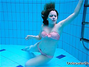 cool female flashes fabulous figure underwater
