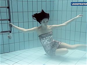 displaying bright milk cans underwater makes everyone super-naughty